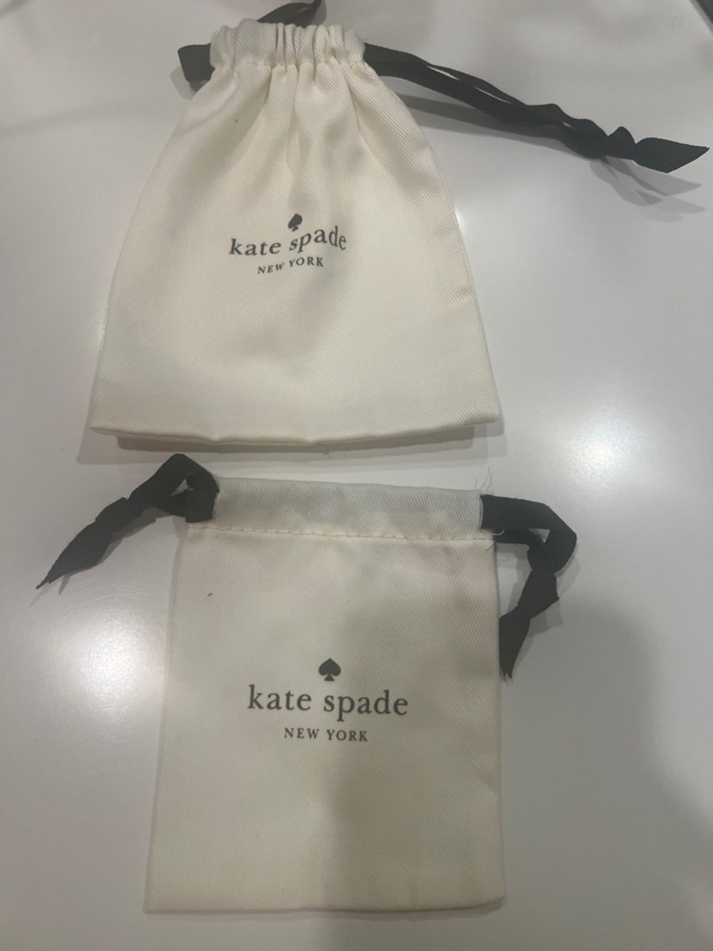 kate spade Cream Drawstring Jewelry Pouches with Black Ribbon (2)